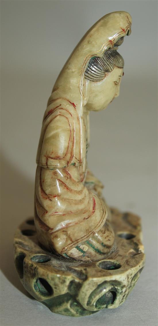 A Chinese soapstone seated figure of Guanyin, 18th century, 9cm